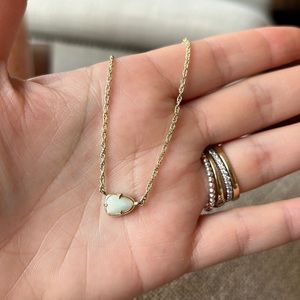 Simple mother of pearl stone and gold chain Kendra Scott necklace